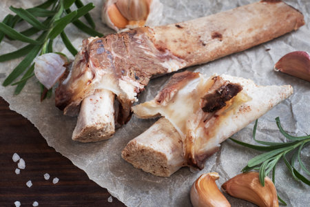 Beef bone and vegetable ingredients for cooking broth. Healthy food with collagen and amino acids. Copy spaceの写真素材