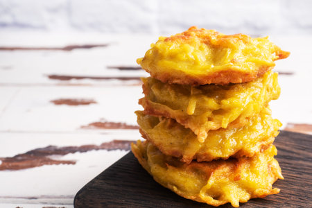 Fried cakes of grated potatoes on the plate with sauce. Traditional pancakes boxty raggmunk
