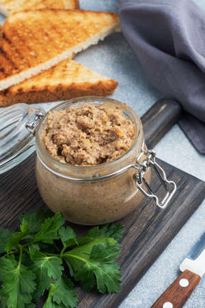 Homemade chicken liver pate in a glass jarの写真素材