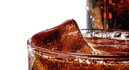 Cola with the ice in a glass, white background, studio shotの写真素材