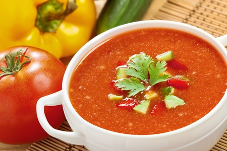 Gazpacho and ingredients on a table, vegetable soupの写真素材