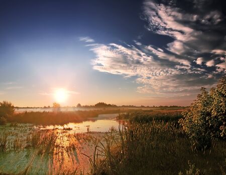 Landscape, sunny dawn at the riverの写真素材