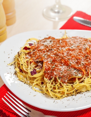 Pasta with sauce and parmesan cheeseの写真素材