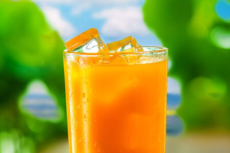 Fresh orange juice, cold drink with iceの写真素材