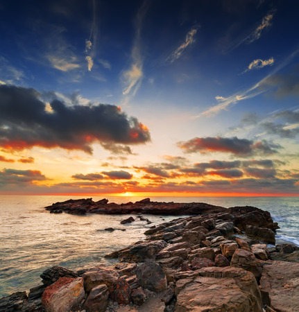 Sea landscape, sunset with cloudsの写真素材