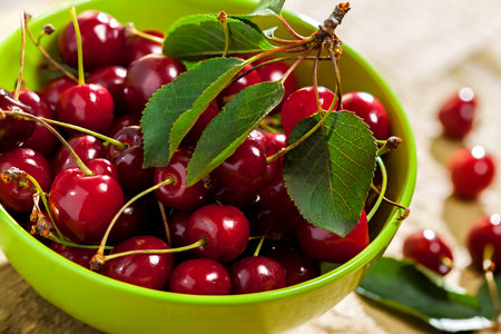 Cherries in bowl on table
