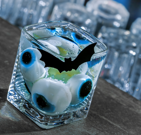 Halloween coktail with eyesの写真素材