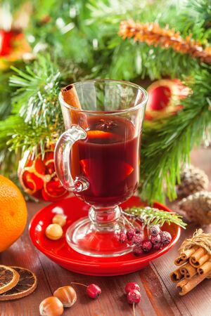 Traditional Christmas hot drink. Mulled wine for New Year Eve celebration party.の写真素材