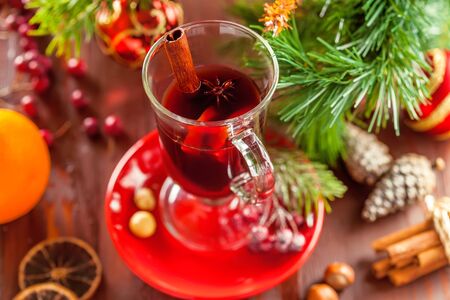 Mulled wine with citrus fruits and cinnamon. Traditional winter hot drink for Christmas.の写真素材