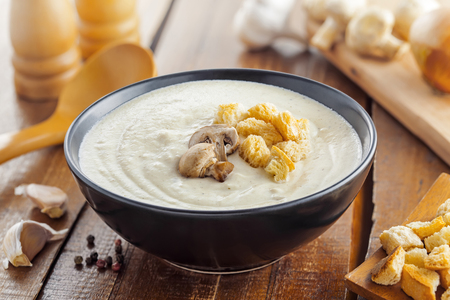 Traditional French mushroom cream soup in a bowl served for lunch, food cookingの写真素材