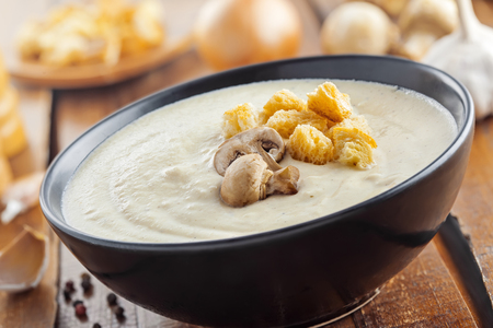 Cooking of mushroom cream soup, French traditional food, close-upの写真素材