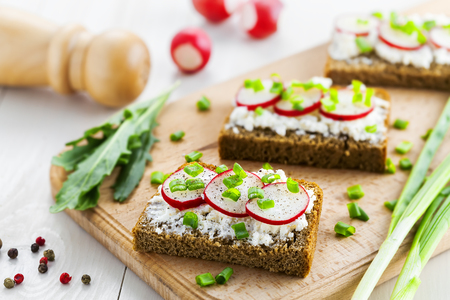Cream cheese ray sandwiches with radish.の写真素材
