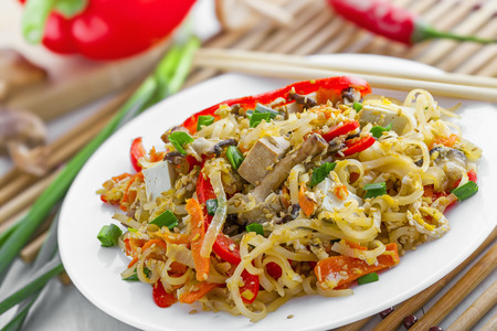 Oriental food made of rice noodles, tofu, vegetables and shiitake mushrooms.の写真素材