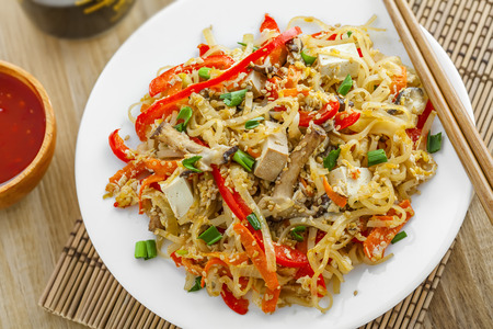 Traditional oriental food made of rice noodles, vegetables, shiitake and tofu.の写真素材