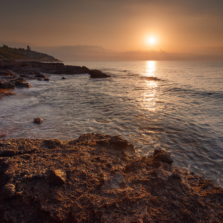 Beautiful sea landscape. Sunset sky above rolling ocean waves.の写真素材