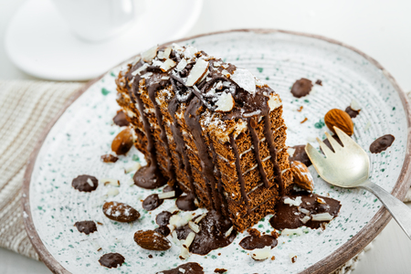 Chocolate Spartak cake for delicious dessert on a table. Traditional sweet food on a rustic plate.の写真素材