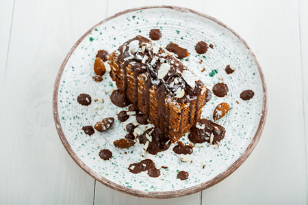 Delicious sweet chocolate Spartak cake on a rustic plate. Haute cuisine dessert. International food. Top view.の写真素材
