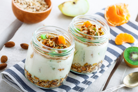 Healthy meal made of granola, yogurt and fruits. Delicious food for breakfast. Traditional American snack.の写真素材