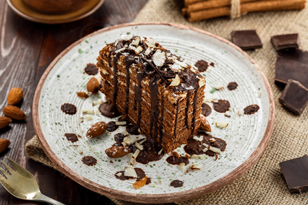 Chocolate Spartak cake for delicious dessert on a table. Traditional sweet food on a rustic plate.の写真素材