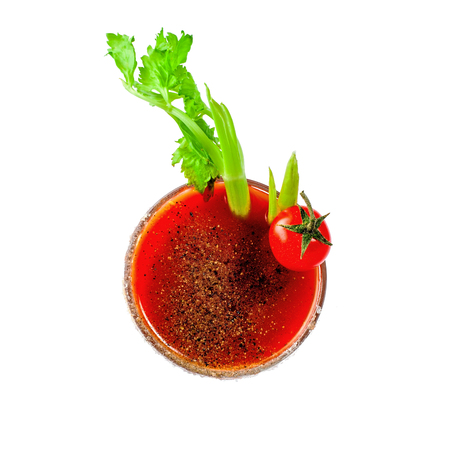 Classic bloody mary in a glass isolated on a white background. Alcoholic drink made of tomato juice, vodka, pepper, salt, lemon juice, celery and other flavorings.の写真素材