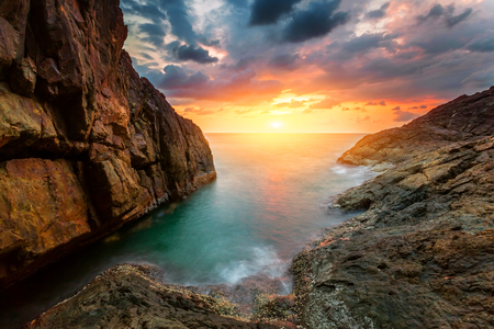 Beautiful sea landscape. Sunset sky above rolling ocean waves.の写真素材