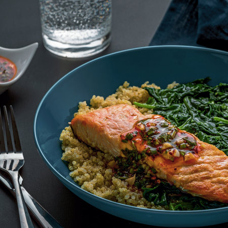 Clean Eating Plate Featuring Salmon, Quinoa, and Greens.の写真素材