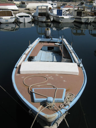Little boat on the dock, in the sea. Adriatic sea, summer fun.の写真素材