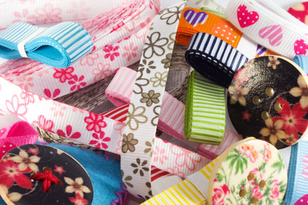 Sewing accessories, including buttons, needles and bows 