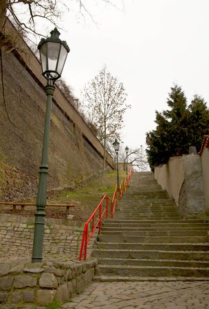 Street lamp with its historical surroundings の写真素材