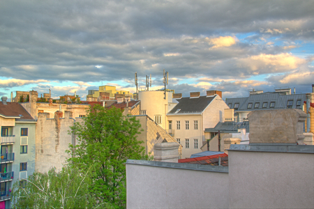 Photo shows details of general house roofs and clouds の写真素材