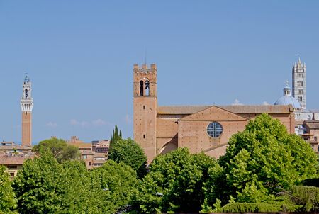 Photo shows a general view of the Tuscany city of Siena.の写真素材