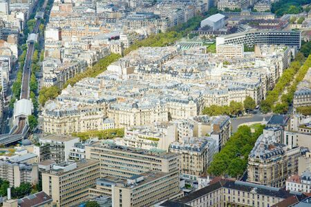 Photo shows Parisian cityscape taken on the skyscraper with various houses and monuments.の写真素材