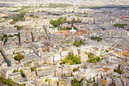 Photo shows Parisian cityscape taken on the skyscraper with various houses and monuments.の写真素材