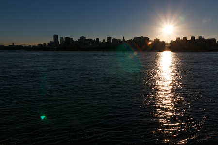 Photo shows landscape view of Montreal city during autumn sunny day.の写真素材