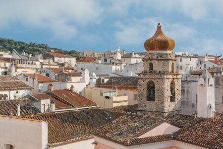 Photo shows close-up of historical city view with various houses and roofs.の写真素材