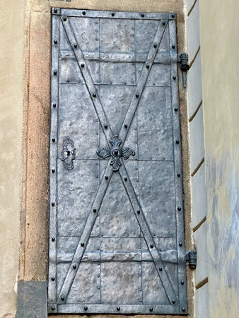 Old medieval metal door in Prague, Czech Republic. Close up.