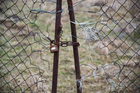 Lock with chain on the old gate. Set of backgroundsの写真素材