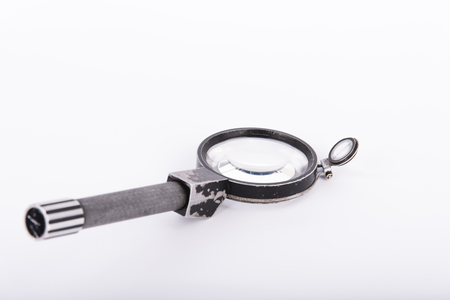 Magnifying glass on a white background, expert tools. Ukraineの写真素材