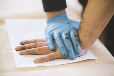 The process of getting samples of fingerprints hands for further study. Ukraineの写真素材