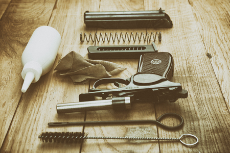 Separate parts of Makarov pistol and cleaning kitの写真素材