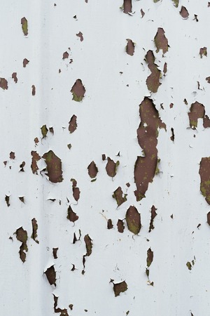Detail of the old painted metal surface with clear surface structure, backgroundの写真素材