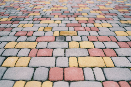 Walkway near a private house lined with colored pavement, detailの写真素材