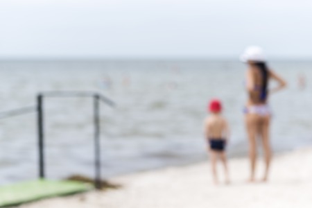 Summer beach with blurry effect, people on the beach, abstractの写真素材