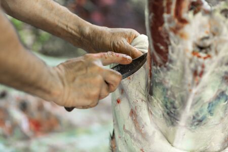 Butcher disassembles carcass of young veal, work process, Ukraineの写真素材
