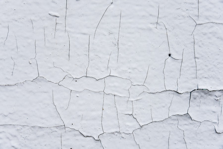 Detail of the old cracked paint, white color, backgroundの写真素材