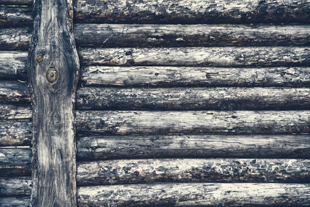 Wooden fence made from wooden scraps, impressive structure, background with vintage effect. Ukraineの写真素材