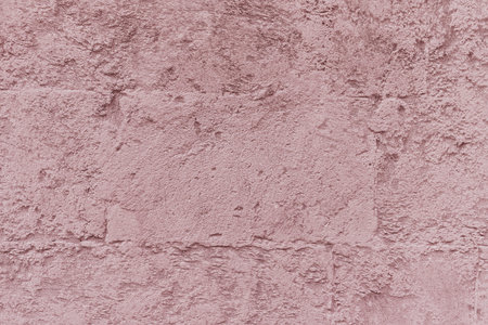 Plastered brick wall, large bricks, color toning, surfaceの写真素材