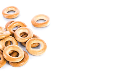 Bagels on white background, shadows and reflections, copy space, template for label
