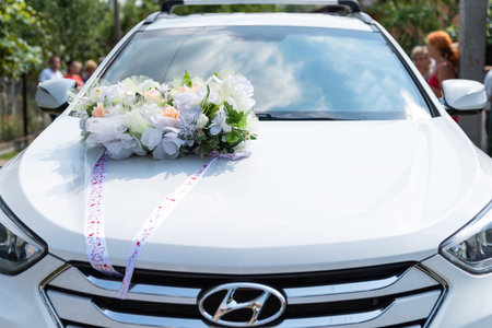 Hyundai Santa Fe decorated on wedding day, decoration on car hood, organization of solemn events, editorial use onlyのeditorial素材
