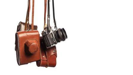 Vintage cameras isolated on white background with clipping path. Old-fashioned analog 35mm cameras...